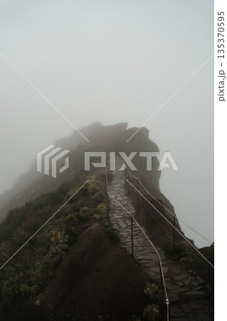 ancient stone staircase leading into fog, pilgrimage route ancient stone staircase leading into fog, pilgrimage route 135370595
