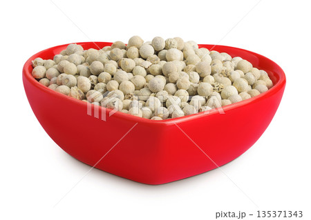 White peppercorns or pepper in ceramic bowl isolated on white background White peppercorns or pepper in ceramic bowl isolated on white background 135371343