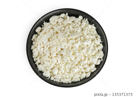 Cottage Cheese, Curd in ceramic bowl isolated on white background. Top view. Flat lay Cottage Cheese, Curd in ceramic bowl isolated on white background. Top view. Flat lay 135371373