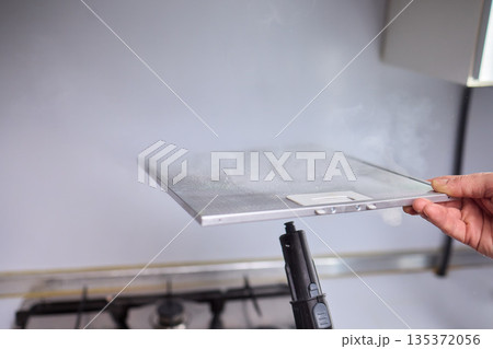 Utilizing Steam Cleaning Techniques on Kitchen Hood Filters for Effective Deep Cleaning Tasks 135372056