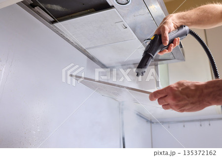 Utilizing Steam Cleaning Techniques on Kitchen Hood Filters for Effective Deep Cleaning Tasks 135372162