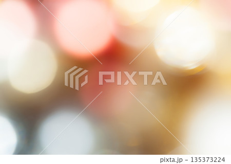 Colorful blurred lights create a warm and inviting atmosphere during a festive night Colorful blurred lights create a warm and inviting atmosphere during a festive night 135373224
