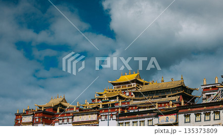 Songzanlin Monastery daylight view with blue sky and clouds, Shangri-La, China Songzanlin Monastery daylight view with blue sky and clouds, Shangri-La, China 135373809