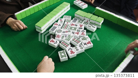 Chengdu, Sichuan, China. Men Playing Mahjong At Automatic Mahjong Table. Friendly Playing. People Playing Mahjong. Hands Of Mahjong Players. Live Game, Close Up View. Asian Culture. Travel China 135373811