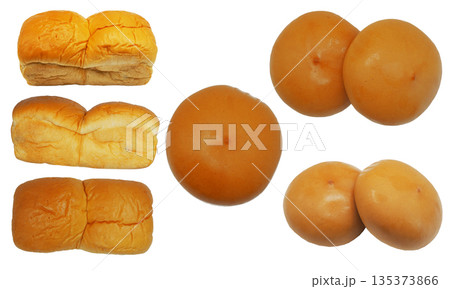 Collection of golden brown bread loaves and soft buns isolated on white background. 135373866