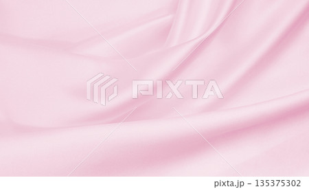Smooth elegant pink silk or satin texture as wedding background. Luxurious background design Smooth elegant pink silk or satin texture as wedding background. Luxurious background design 135375302