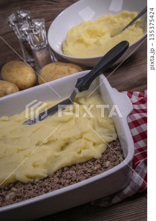 Hachis parmentier, french dish with mashed potato and minced beef 135375424