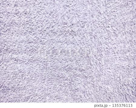 lavender fluffy texture closeup soft purple fabric surface gentle fibers serene mood abstract composition ideal for calming wallpaper or subtle banner background lavender fluffy texture closeup soft purple fabric surface gentle fibers serene mood abstract composition ideal for calming wallpaper or subtle banner background 135376113