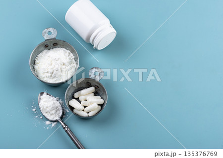 Collagen powder and pills. Healthy supplement 135376769