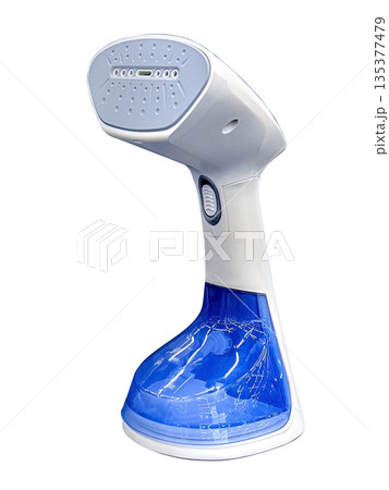 Handheld garment steamer removing wrinkles from clothes 135377479