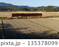稲刈り後の田んぼと平成筑豊鉄道「ことこと列車」 135378099