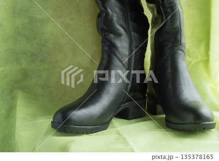 Pair of women's fashion black leather boots 135378165