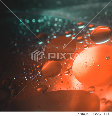 Glowing Orange Oil Bubbles In Dark Abstract Liquid 135379151