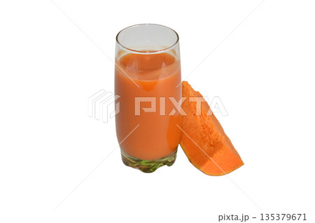 Ripe pumpkin and a glass of pumpkin juice. Ripe pumpkin and a glass of pumpkin juice. 135379671