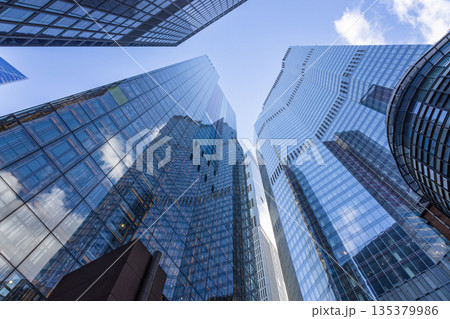 Modern Glass Skyscraper Buildings in Business District Modern Glass Skyscraper Buildings in Business District 135379986