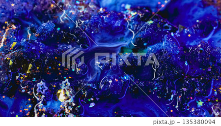Paint spill defocused. Ink spread. Sparkling blue dye abstract curl flow on acrylic texture. Colorful flare confetti wave stream background. 135380094