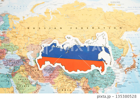 Bangkok, Thailand December 7, 2023, Russia flag on world map background. flag on world map. 135380528