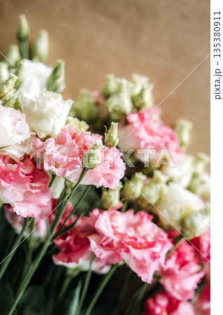 Large bouquet of cream and pale pink roses with soft petals fills frame in gentle light. Florist education, DIY botanical workshop, flower arranging class. Large bouquet of cream and pale pink roses with soft petals fills frame in gentle light. Florist education, DIY botanical workshop, flower arranging class. 135380911