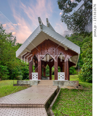 Ornate Wooden Pavilion with Traditional Carvings at Mausoleum of Sultan Sharif Ali, Bandar Seri Begawan, Brunei 135381676