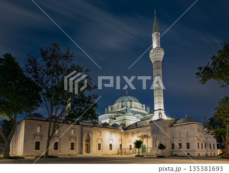 Illuminated Beyazit Mosque at night with long exposure sky, Istanbul, Turkey. Illuminated Beyazit Mosque at night with long exposure sky, Istanbul, Turkey. 135381693