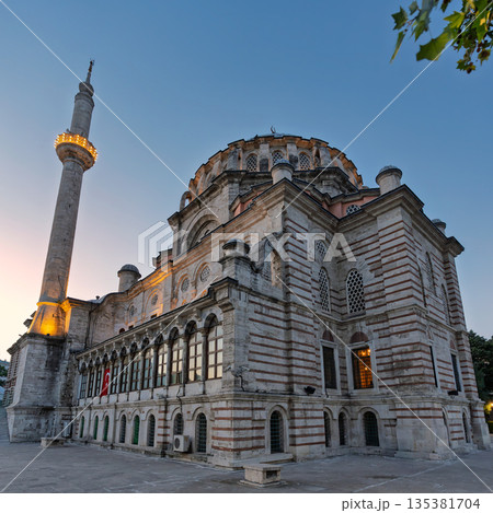 Historic Laleli Mosque, also known as Laleli Camii, illuminated at twilight in Istanbul, Turkey. 135381704