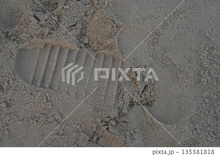 top view footprints on the beach background, object, decor, fashion, copy space 135381818