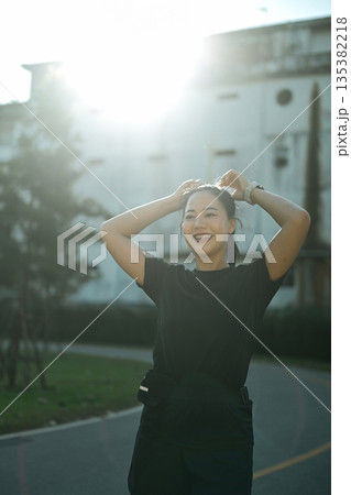 Woman enjoying calm wellness moment in nature Woman enjoying calm wellness moment in nature 135382218