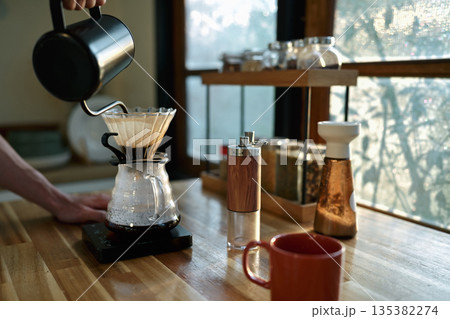 Coffee morning concept, coffee drip process at home Coffee morning concept, coffee drip process at home 135382274