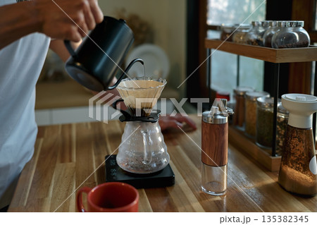 Coffee morning concept, coffee drip process at home Coffee morning concept, coffee drip process at home 135382345