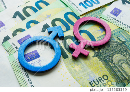 Gender equality symbols on euro banknotes. Equal pay and financial inclusion. 135383359