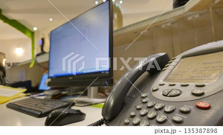 Office Workstation with Phone and Computer Setup Office Workstation with Phone and Computer Setup 135387898