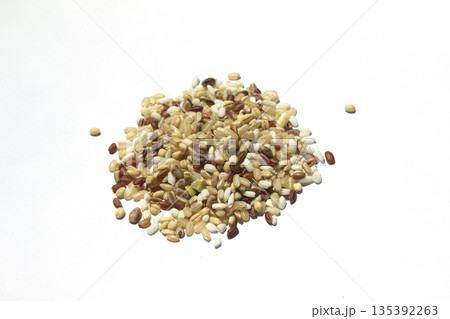 These are grains of mixed grain placed on a white background. These are grains of mixed grain placed on a white background. 135392263