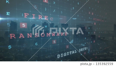 Displaying red RANSOMWARE text overlay above urban skyline at dawn, with grid of cybersecurity code 135392559