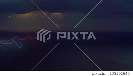 Streaming rays piercing clouds in open sea, with red and blue neon zigzag lines and buoy 135392649