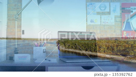 Open laptop displaying code in office workspace, with chemistry posters and riverside overlay Open laptop displaying code in office workspace, with chemistry posters and riverside overlay 135392762