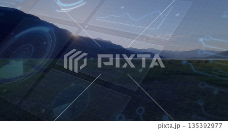 Displaying interface panels overlaying mountain valley dusk, with radar, charts, nodes, markers 135392977