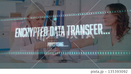 Doctor placing blood pressure cuff on patient arm in consultation room, with encrypted data overlay 135393092