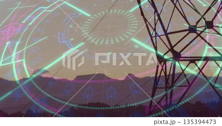Showing lattice steel transmission tower silhouette against dusk mountain skyline, HUD, copy space Showing lattice steel transmission tower silhouette against dusk mountain skyline, HUD, copy space 135394473