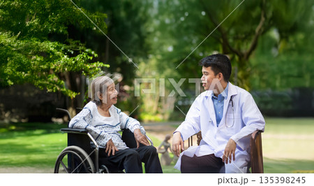 Doctor checking lung of elderly woman during homecare medical. Doctor checking lung of elderly woman during homecare medical. 135398245