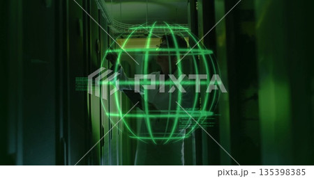 Korean IT technician inspecting holographic globe in data center corridor with tablet, server racks Korean IT technician inspecting holographic globe in data center corridor with tablet, server racks 135398385