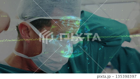 Surgeon wearing scrubs and mask securing headgear in OR, with holographic globe and waveforms Surgeon wearing scrubs and mask securing headgear in OR, with holographic globe and waveforms 135398397
