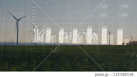 Showing large wind turbine spinning over green crops on farmland, with metric overlays, copy space Showing large wind turbine spinning over green crops on farmland, with metric overlays, copy space 135398536