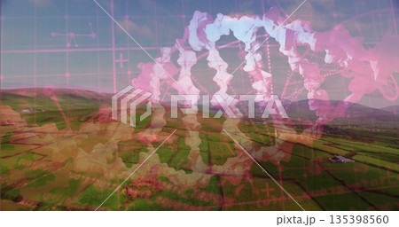 Overlaying translucent pink DNA double helix graphic on farm fields, with grid lines and data nodes 135398560