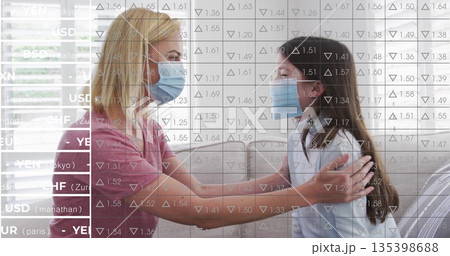 Sitting mother and daughter wearing masks facing each other on sofa at home, with currency overlay Sitting mother and daughter wearing masks facing each other on sofa at home, with currency overlay 135398688
