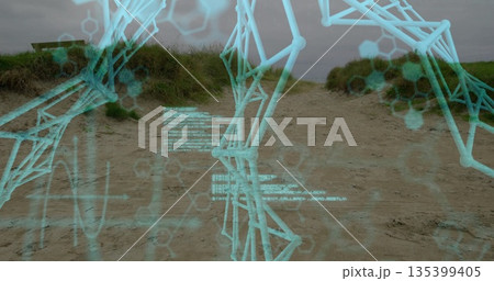 Overlaying turquoise skeletal wireframe on dune path with hex grid and alphanumeric readouts 135399405