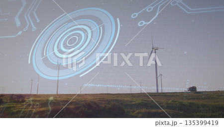 Displaying large wind turbine rotating under clear sky at wind farm, with HUD overlays, copy space Displaying large wind turbine rotating under clear sky at wind farm, with HUD overlays, copy space 135399419