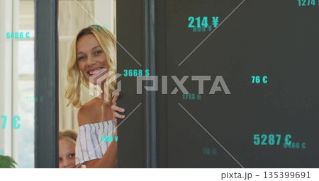 Peeking blonde mother and daughter around door frame at home, with turquoise symbols, copy space Peeking blonde mother and daughter around door frame at home, with turquoise symbols, copy space 135399691