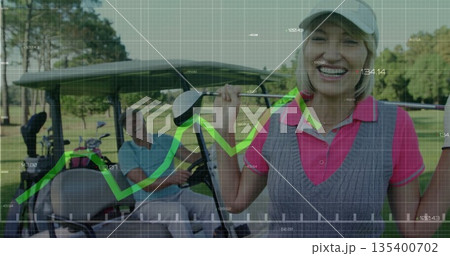 Holding golf club beside golf cart, golfer wearing pink polo viewing overlay on fairway, copy space Holding golf club beside golf cart, golfer wearing pink polo viewing overlay on fairway, copy space 135400702