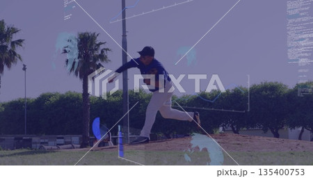 Pitching adult male extending arm, lifting leg on mound at baseball field, with glove, cap, palms 135400753