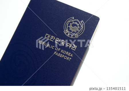 It is a South Korean electronic passport on a white background. It is a South Korean electronic passport on a white background. 135401511
